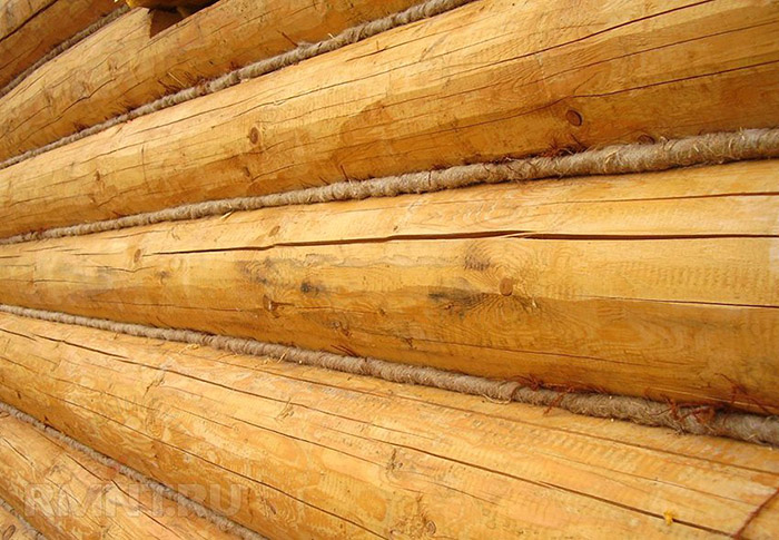 Конопатка деревянного сруба